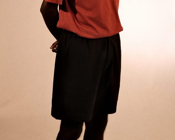 bakr — plain unisex shorts in rust black