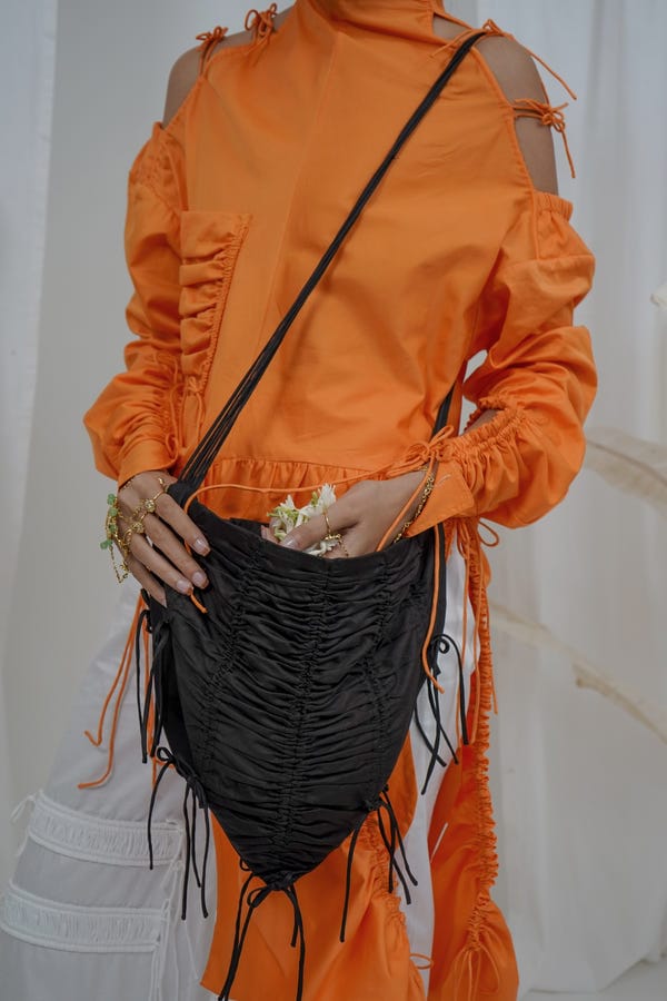 Saim — Gathered flap bag