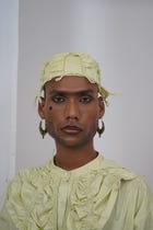 Strapped round topi view 2