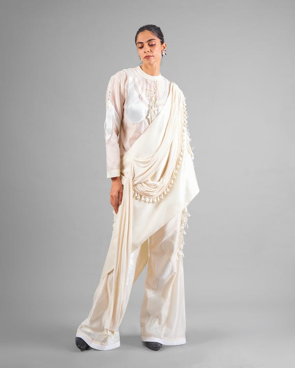 Saim — Patchwork ornament top + Tassel drape one shoulder + Outline godet trouser set