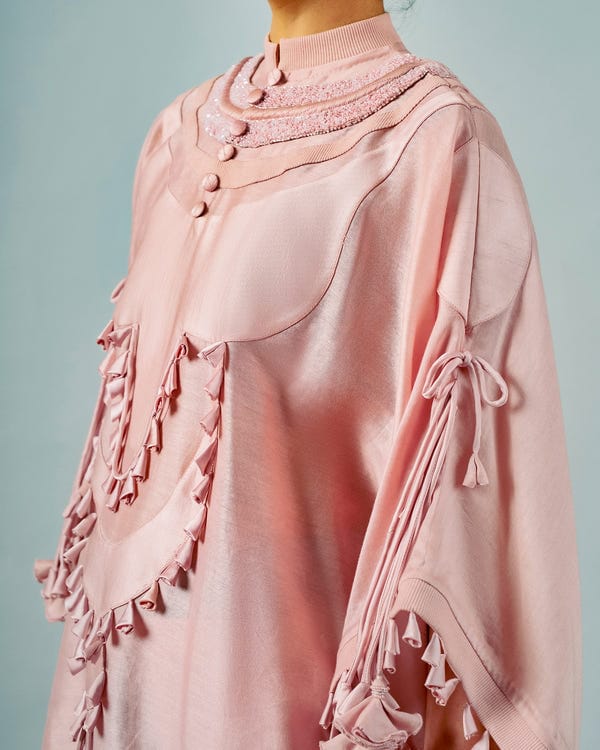 Saim — Tasseled necklines cape + Godet lungi skirt set