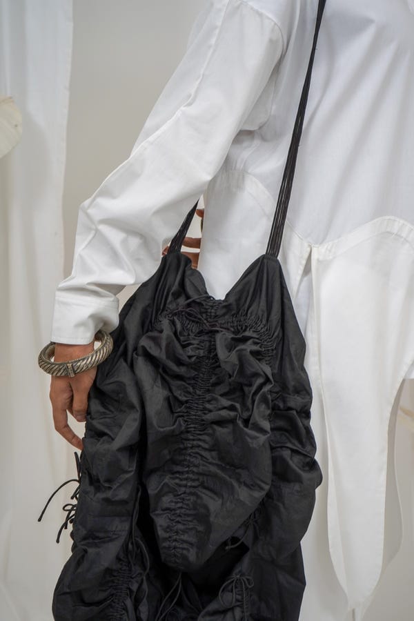 Saim — Gathered hoodie bag