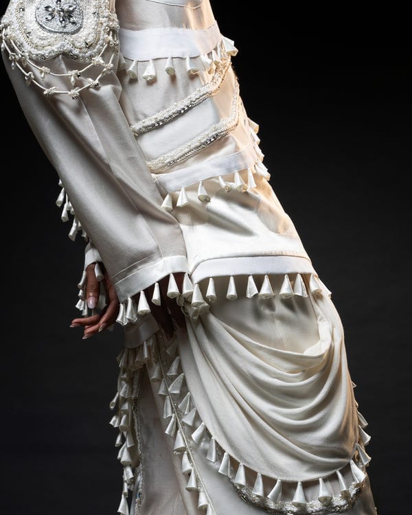 Saim — Ornament patchwork jacket + Drape tassel trouser set