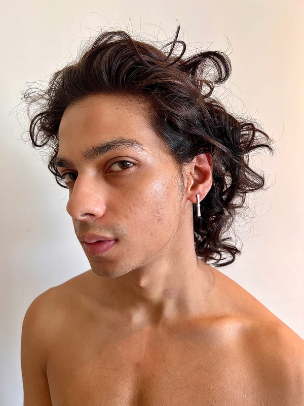 Saim — The logo earrings