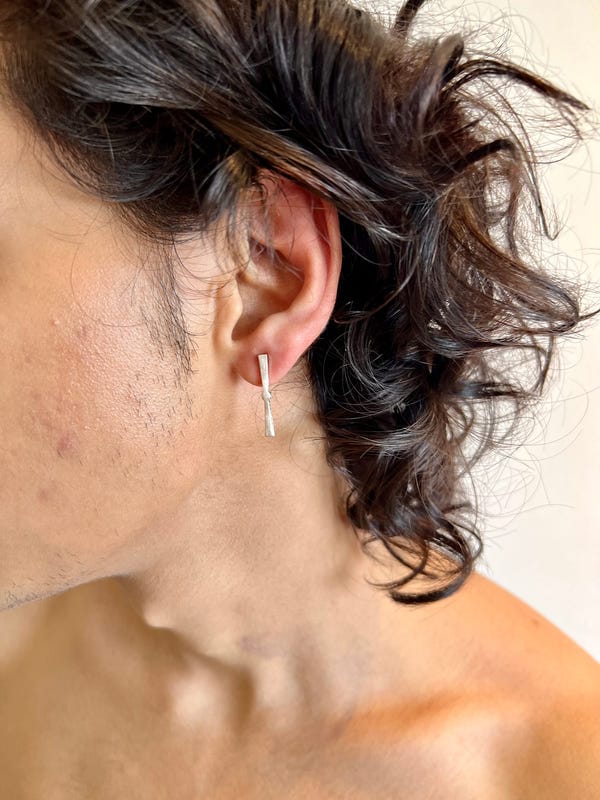 Saim — The logo earrings