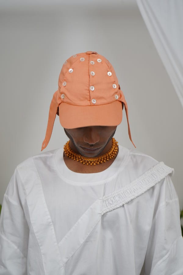 Saim — Deconstructed buttons cap