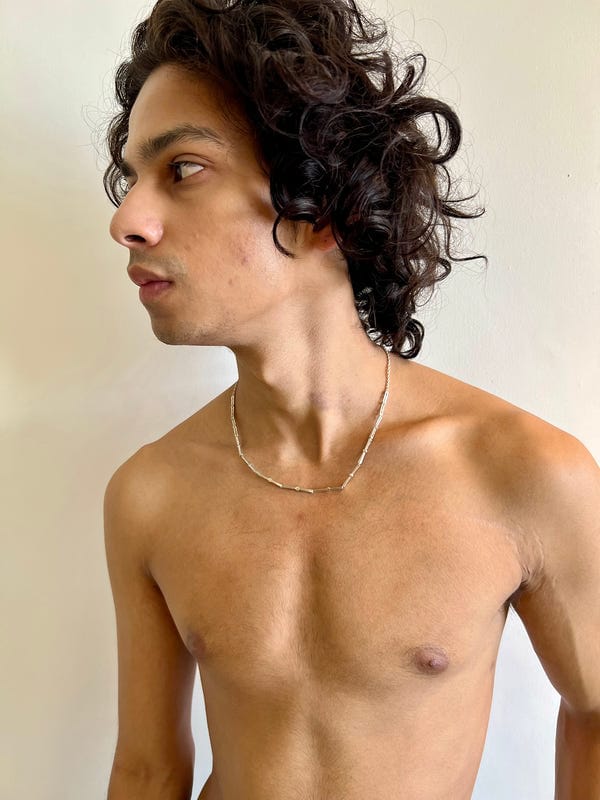 Saim — The logo necklace